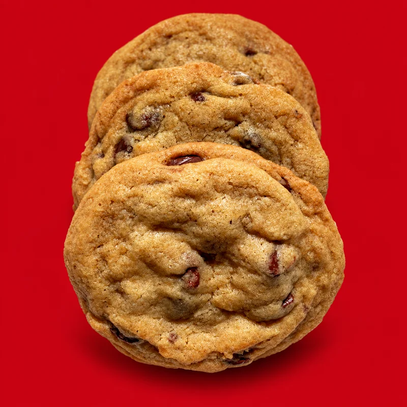 Fresh OH BOYD! semi-sweet chocolate chip cookies on red backdrop